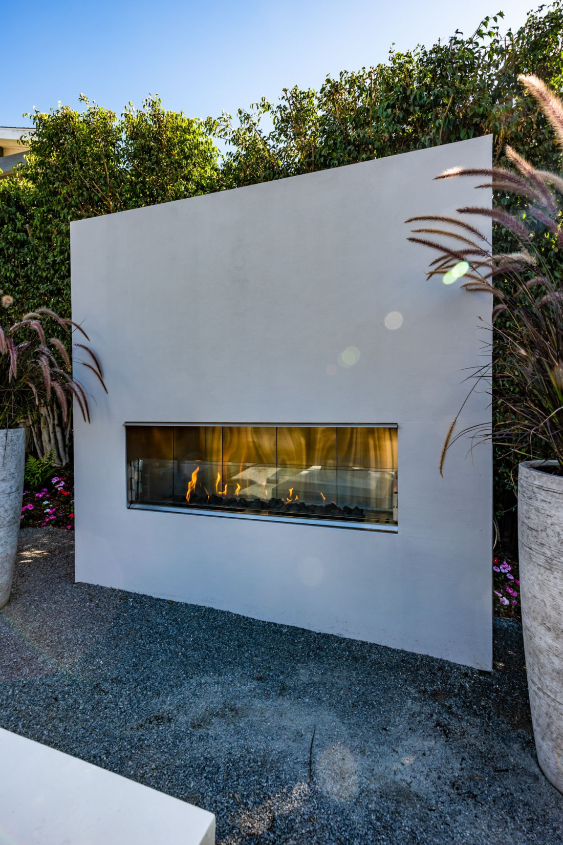 Better Outdoor Living with the Sleek Kalea Bay Outdoor Fireplace